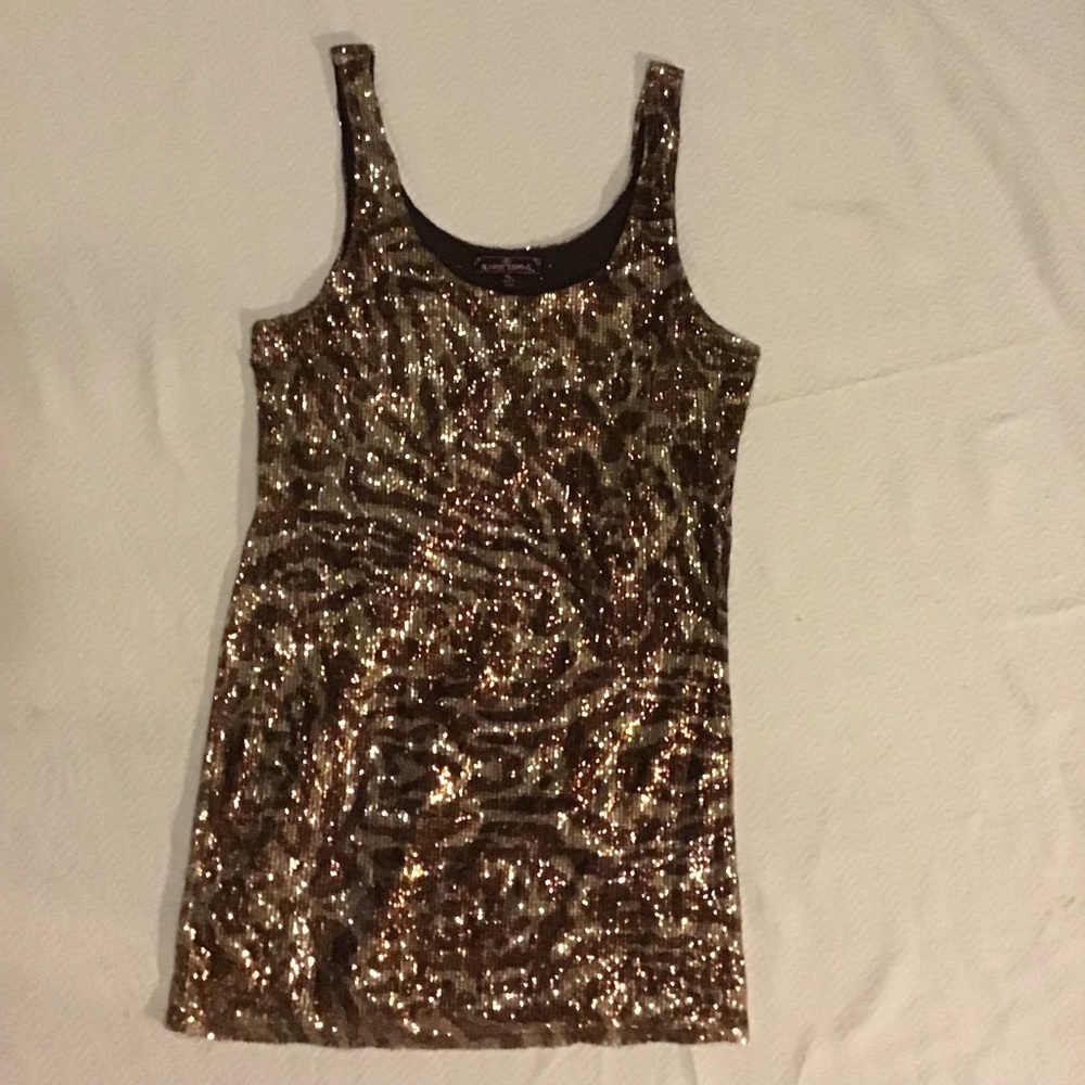 Almost Famous animal print sequin dress